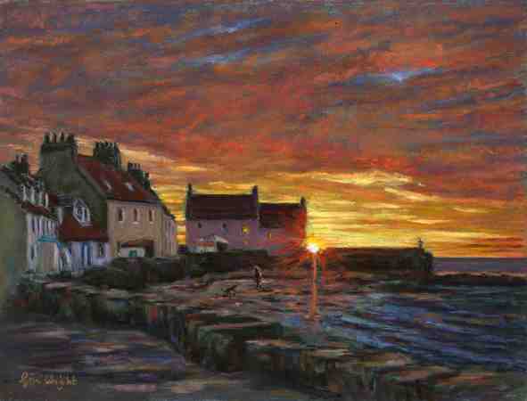 Sun rising behind the Rock Villa at West Shore Pittenweem